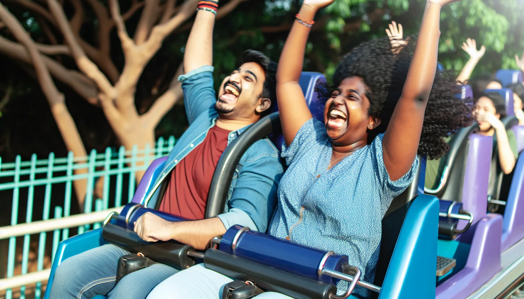 Couple enjoying a roller coaster ride